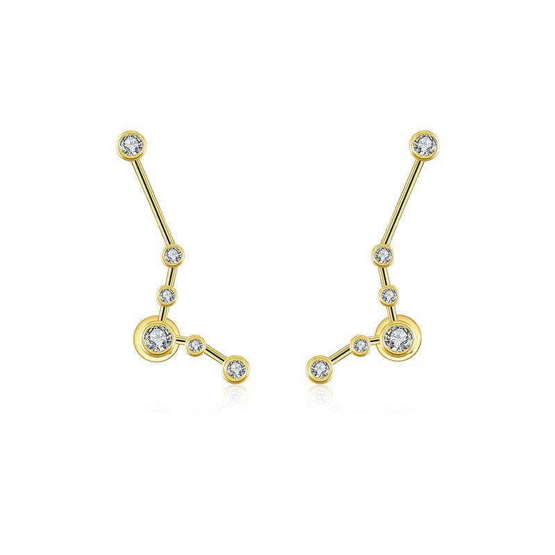 18K gold zodiac constellation diamond earrings showcasing unique celestial designs with sparkling diamonds.