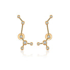 18K gold zodiac constellation diamond earrings featuring sparkling diamonds in unique designs.