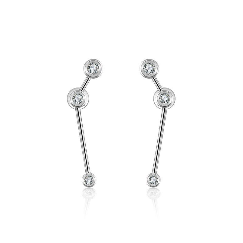 18K gold zodiac constellation diamond earrings featuring sparkling diamonds in celestial designs.