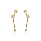 18K gold zodiac constellation diamond earrings showcasing celestial elegance and sparkling charm.