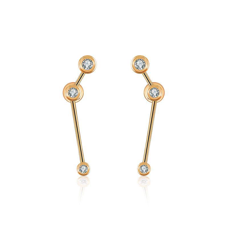 18K gold zodiac constellation diamond earrings showcasing celestial elegance and sparkling charm.