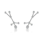 18K gold diamond zodiac constellation earrings showcasing celestial designs in elegant white gold.