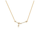 18K gold zodiac constellation diamond necklace showcasing unique celestial design with sparkling diamonds.