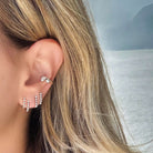 Close-up of Two-Row Caged Lobe Diamond Earrings showcasing diamonds and 14K gold design from Izakov Fine Jewelry.