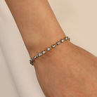 Multi Shape Diamond Black Bezel Tennis Bracelet in 14k yellow gold