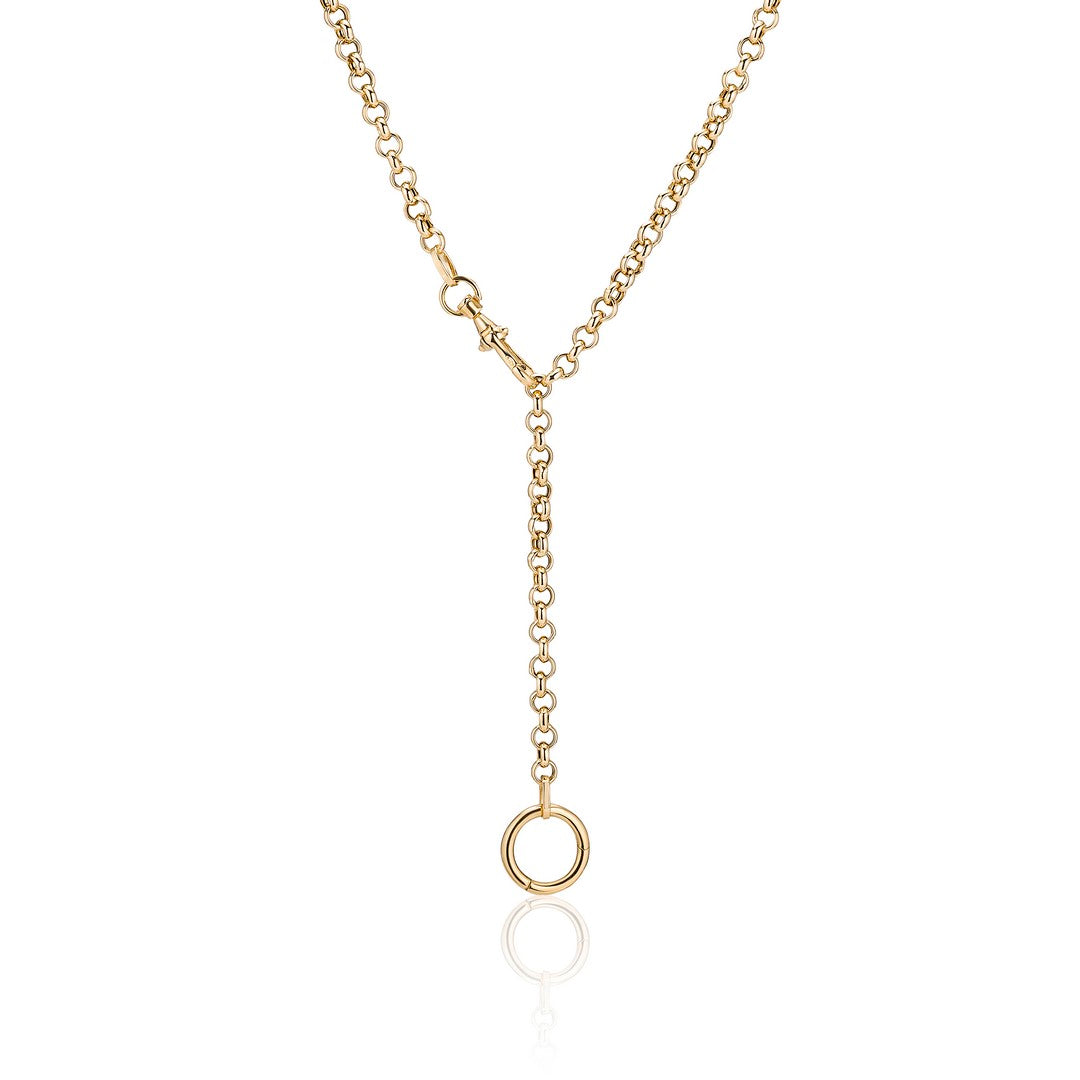 Rolo link gold chain worn with the swivel clasp at the front
