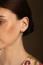 Marquise Diamond Drop Huggie Earrings in 14k yellow gold