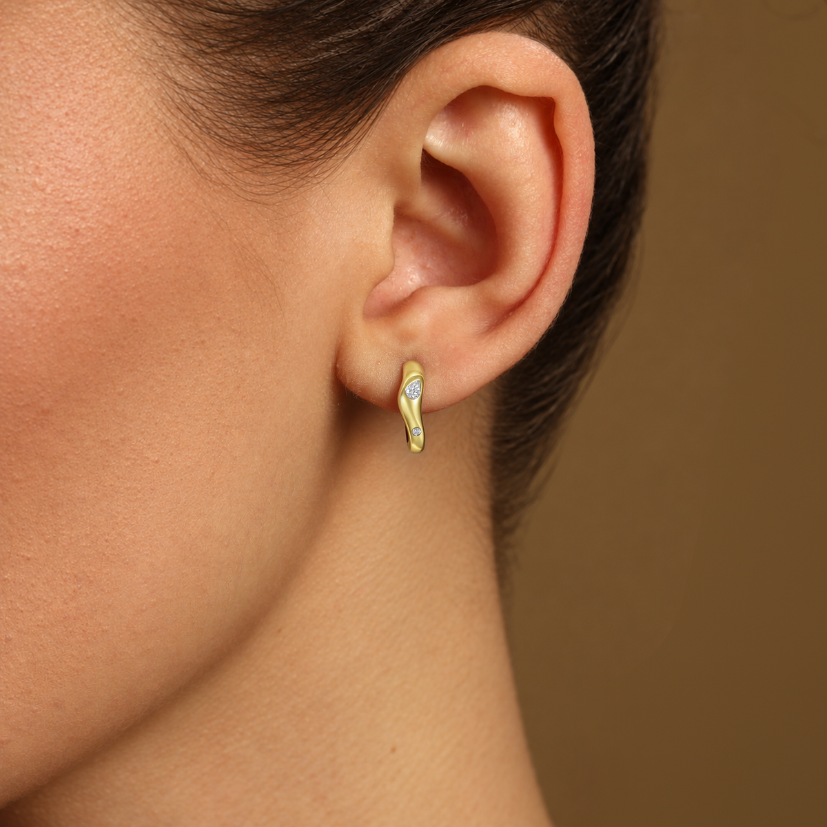 Pear and Round Diamond Chevron Huggie Earrings in 14k yellow gold