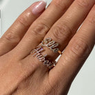 Personalized Script Nameplate Diamond Ring displayed on a hand, showcasing unique font and sparkling natural diamonds.