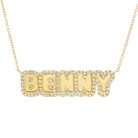 Personalized Diamond Cloud Nameplate Necklace featuring the name 'BENNY' in 14K gold and sparkling diamonds.