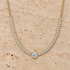 Bezel Center Lab Diamond Tennis Necklace in 14K yellow gold, styled, Izakov Fine Jewelry