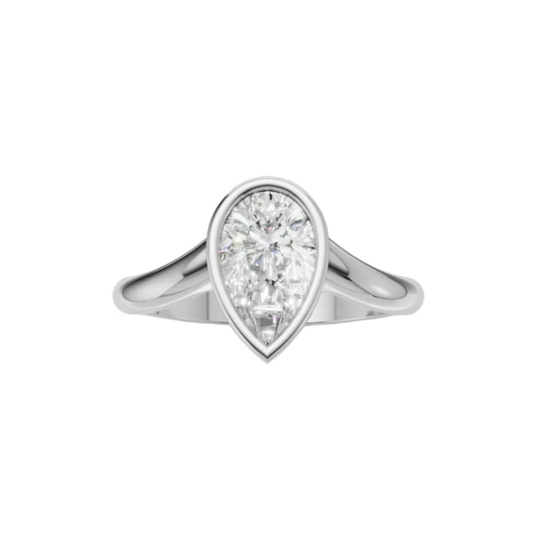 Curved Lab Diamond Bezel Ring featuring a pear-shaped lab diamond in a sleek band design.