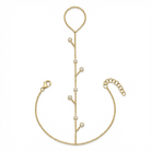 Dangling Bezel-Set Diamond Hand Chain featuring yellow gold and seven round-cut diamonds for sparkling elegance.