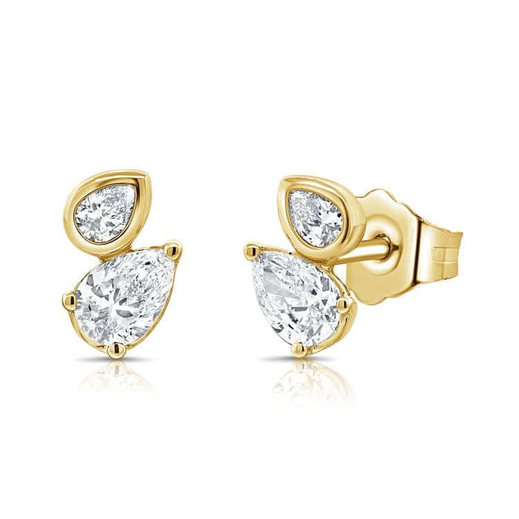 Double Pear Shaped Diamond Earrings in 14k gold with two-stone design and 0.65 carats total weight.