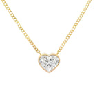 Floating Bezel Heart Shaped Diamond Necklace with a 0.70 carat heart diamond in 14K gold setting by Izakov Fine Jewelry.