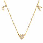 Gold necklace with a heart-shaped pendant on a white background