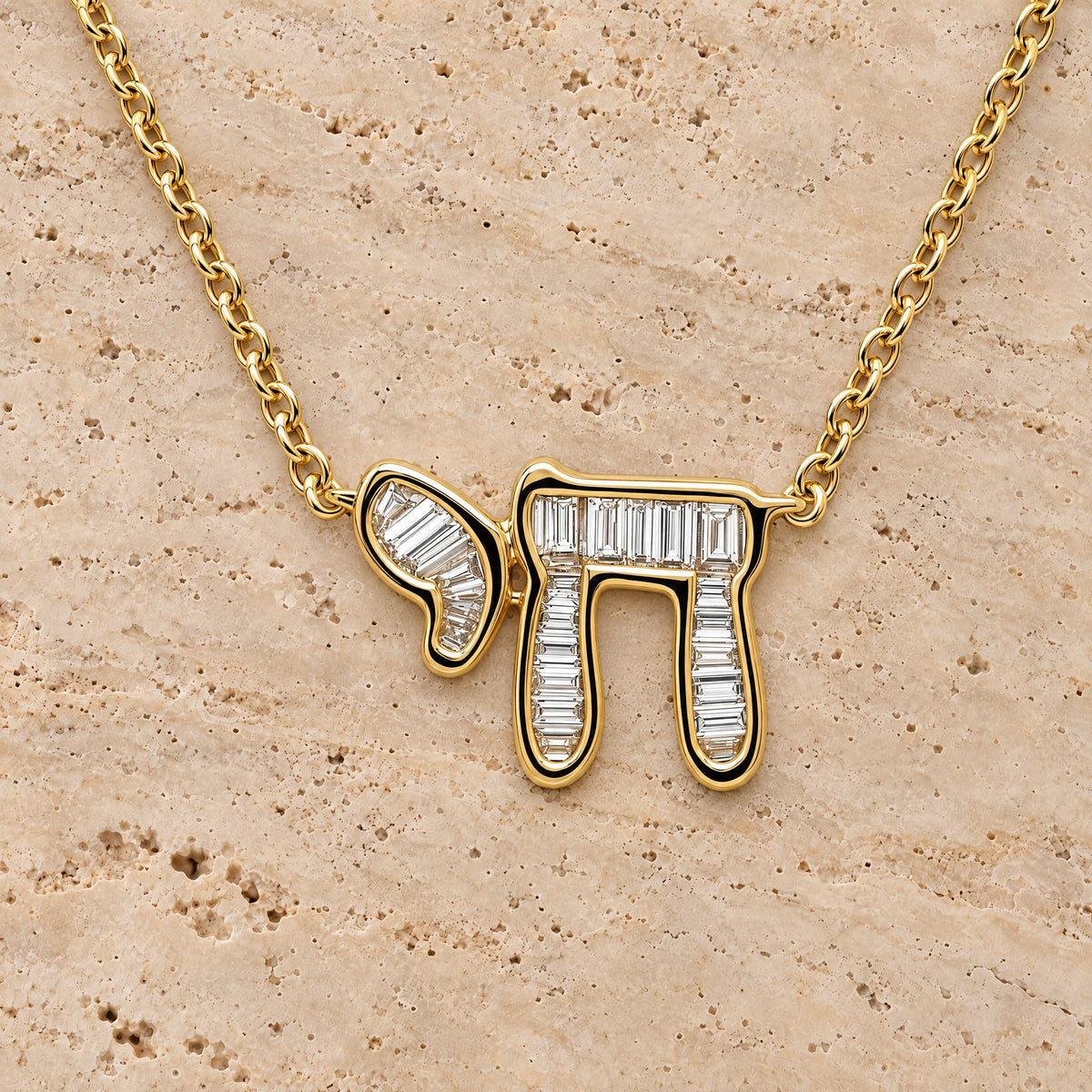Hebrew Chai Baguette Diamond Necklace in 14K yellow gold, styled, Izakov Fine Jewelry