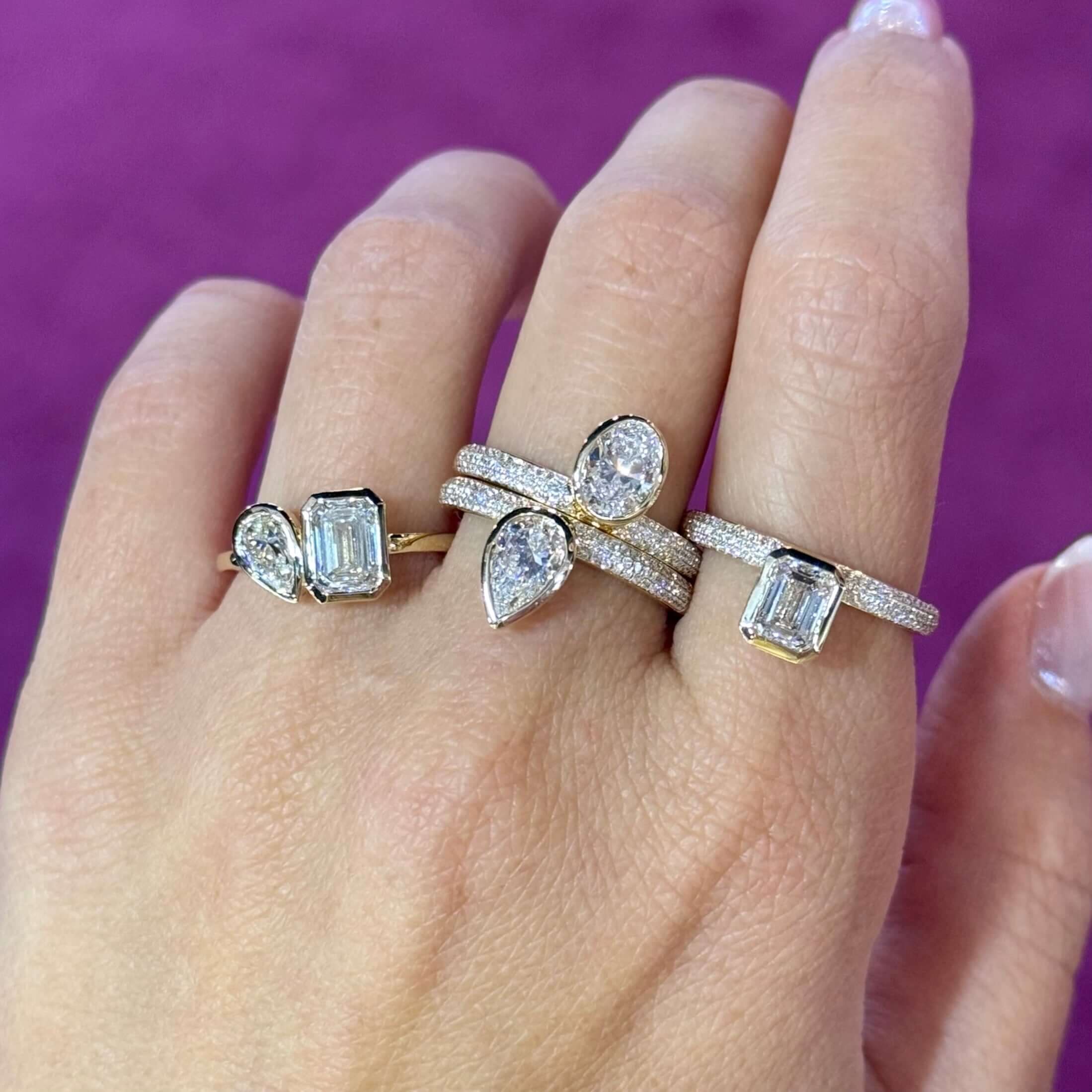 Bezel Lab Diamond Micro Pave Ring displayed on hand with various styles in 14k gold and lab diamonds.