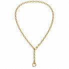 Oval rolo link gold chain necklace clipped into a Y-shape with the swivel clasp