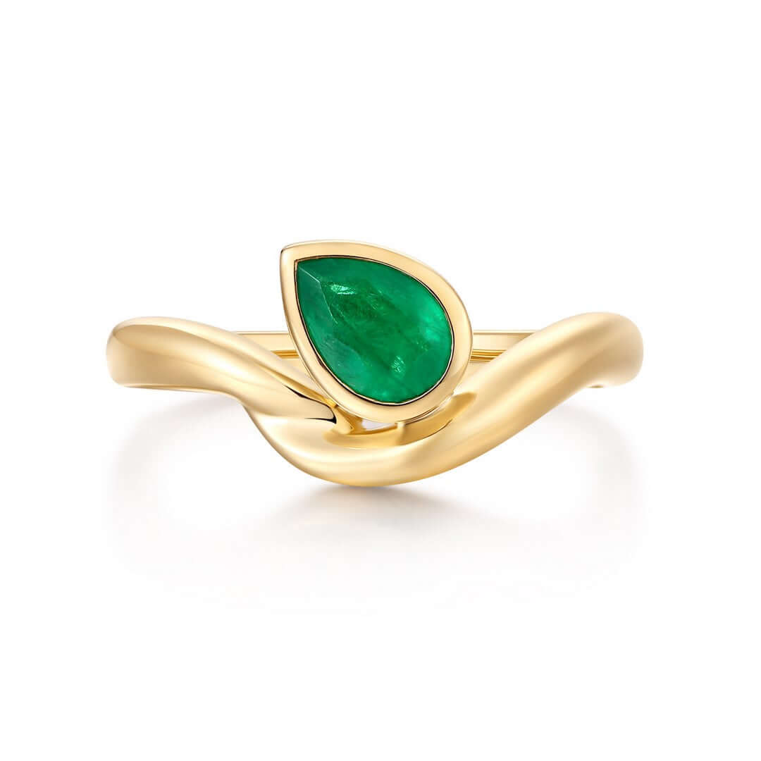 Pear Shaped Emerald Curved Ring in 14k Yellow Gold with a vibrant green pear-shaped emerald.