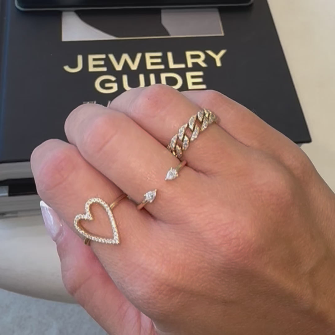 14K Gold Petite Toi et Moi Pear Diamonds Open Ring displayed with other elegant rings on hand.