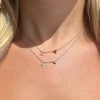 14K Gold Pave Diamond Initial Heart Gemstone Necklace worn with initial and birthstone gems.