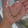 14K Gold Heart Charms Ball Beaded Diamond Necklace with intricate heart charms and delicate beaded chain.