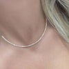 14K Gold Micro Pave Diamond Bar Cable Link Necklace elegantly displayed on a model's neck with a shimmering appearance.