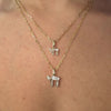 14K Gold Hebrew Chai Baguette Diamond Necklace Charm on layered chains, showcasing small and medium sizes.
