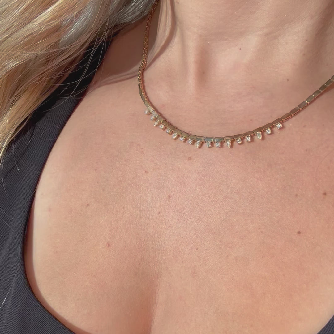 14K Gold Bars Diamond Drops Necklace worn elegantly, showcasing the bar-link design and sparkling diamond accents.